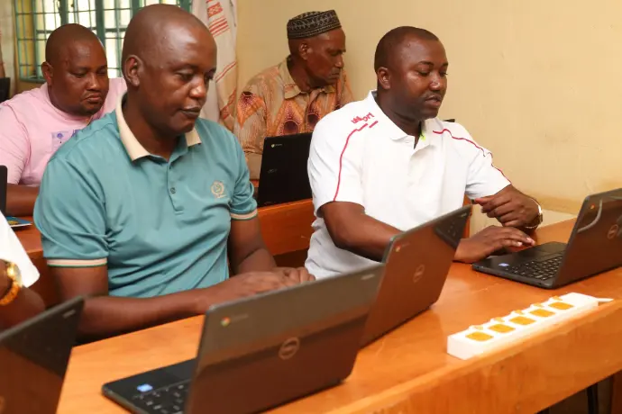 Shikaadabu Secondary principal Mr. Goeorge Kihoro with Mr. Mwakurichwa